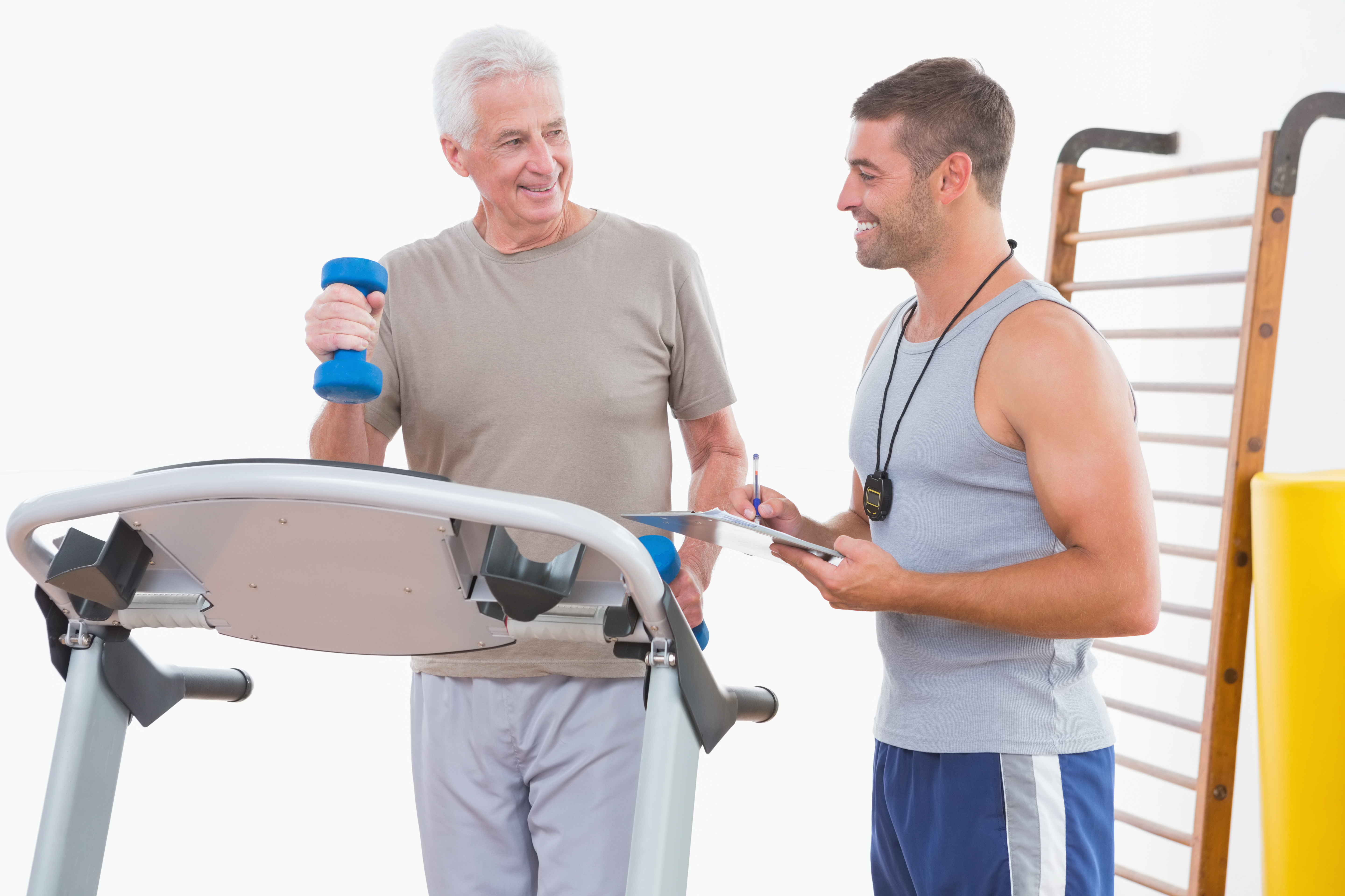 Older Gentleman With Personal Trainer