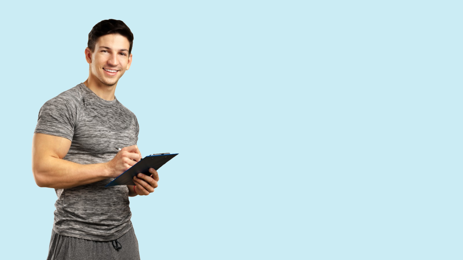 Man in exercise attire holding a clipboard