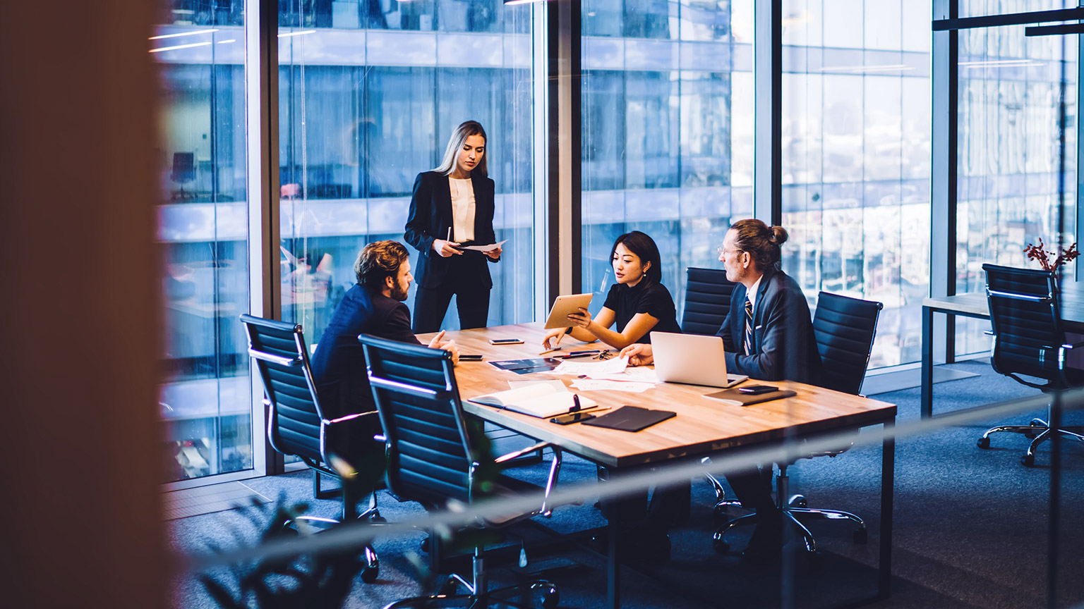 Group of business professionals in a modern office