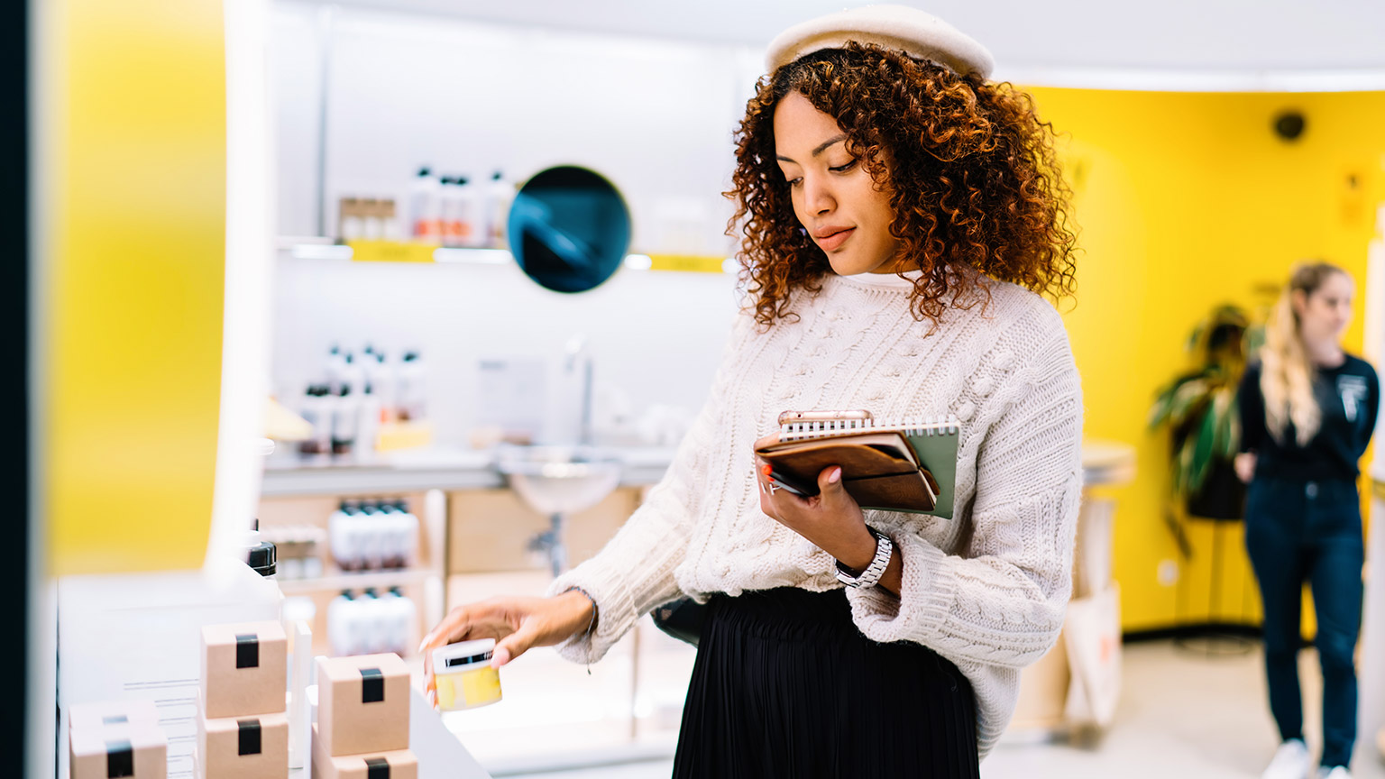 Female shopper examining products in store