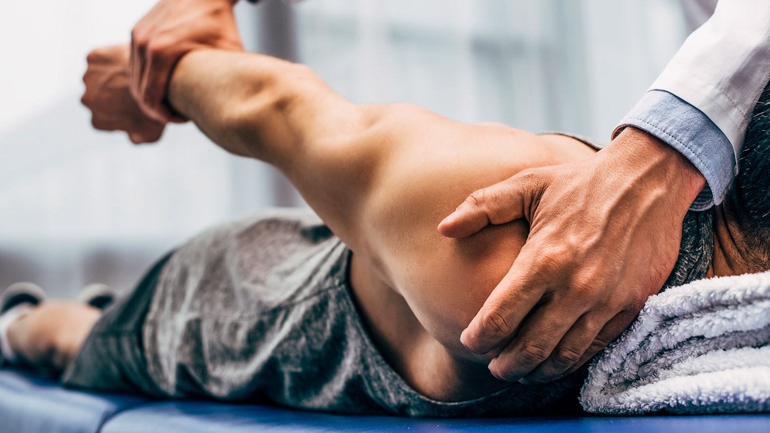 Chiropractor working on client