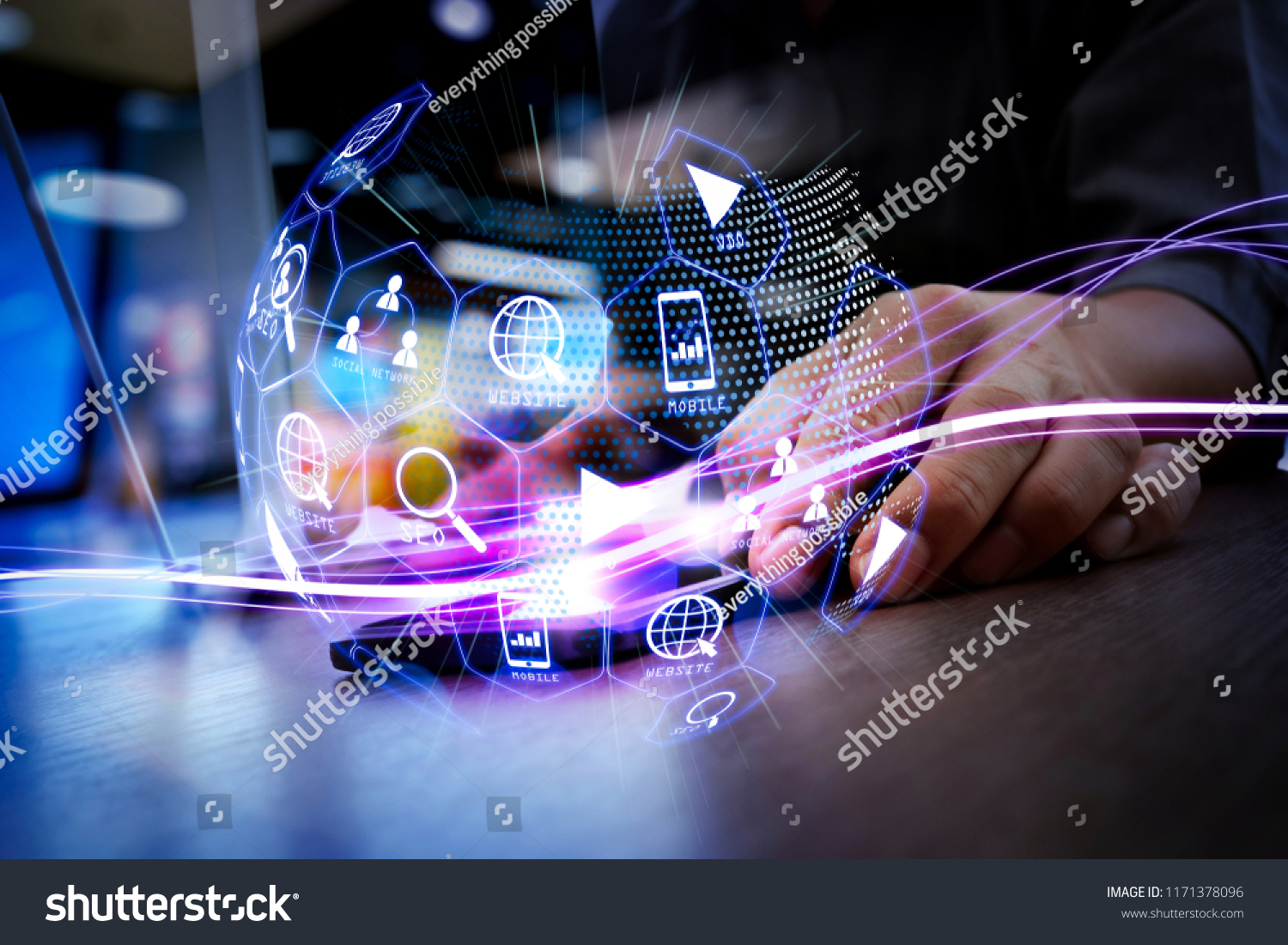 Waves of blue light over globe image and businessman using smartphone.