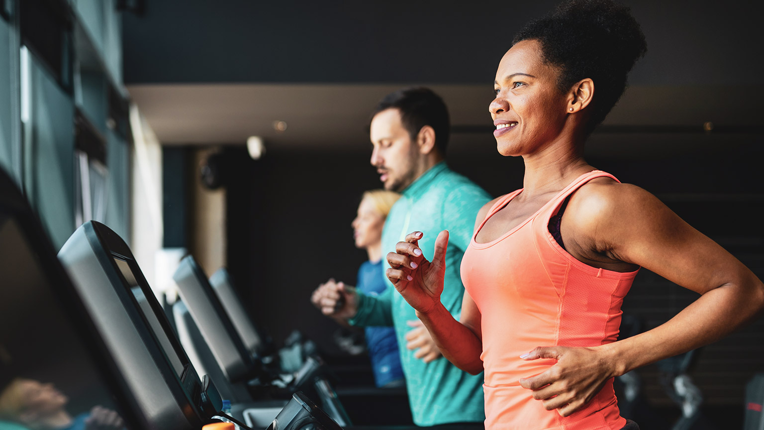 Man and woman doing cardio exercise