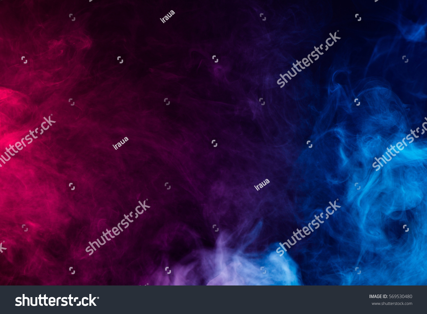 569530480  colorful smoke on dark background