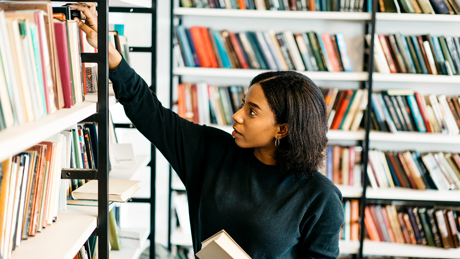 A woman collating references