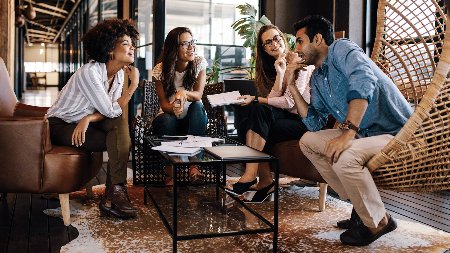 Grouup of busienss professionals networking in a casual environment