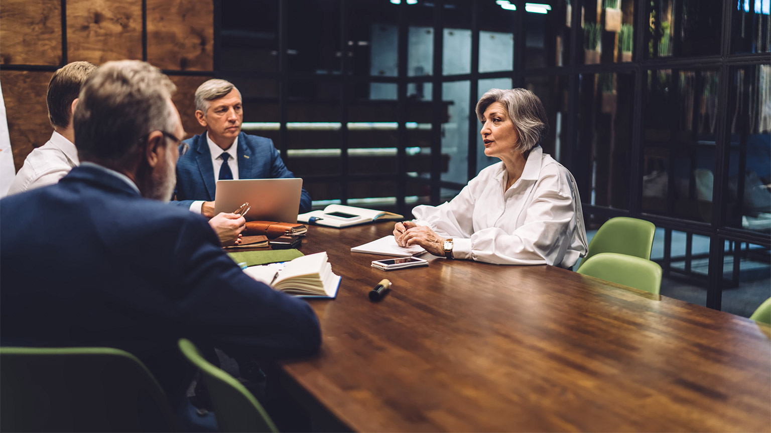 A team of senior accountants conducting a meeting