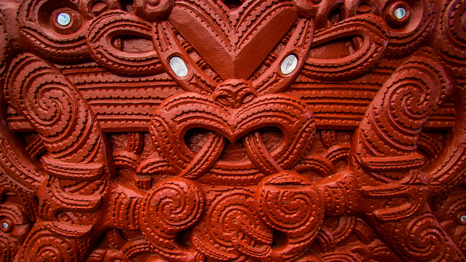 A close view of a maori wood carving