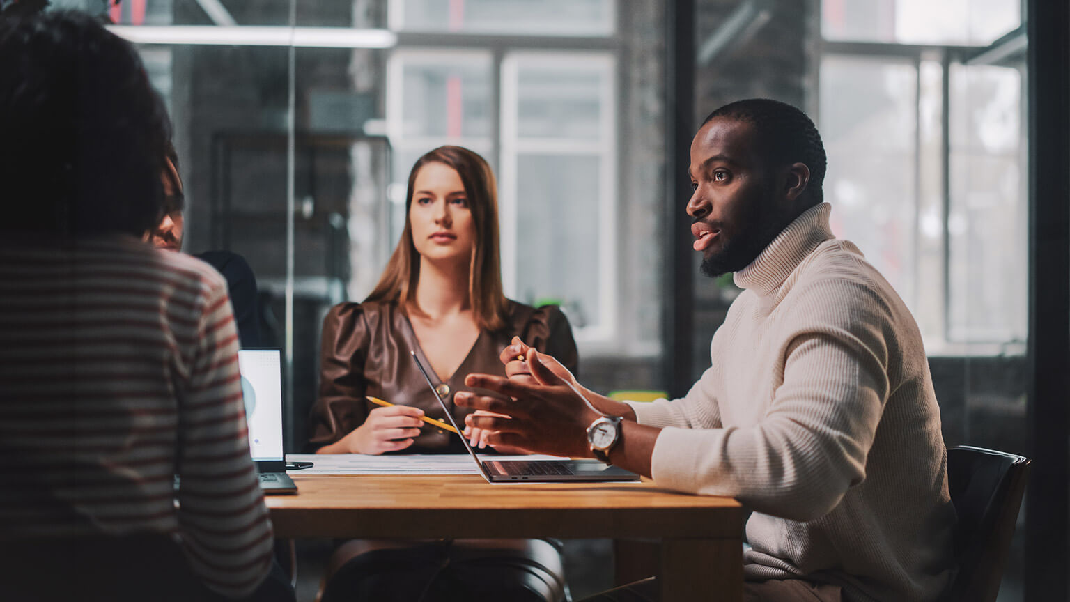 A diverse group meeting in an office