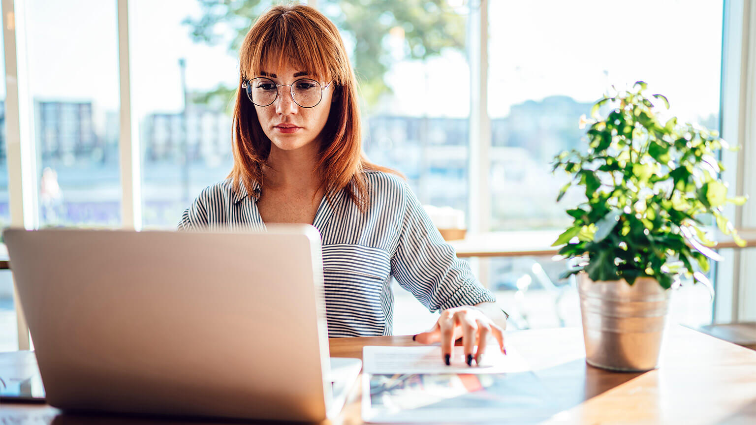 A finance team member reconciling the balance of a major account