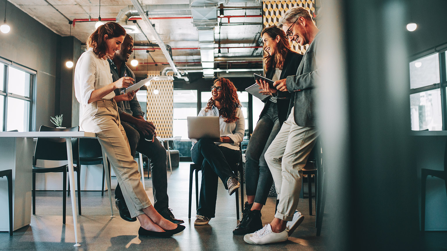 A small team conducting their daily project standup