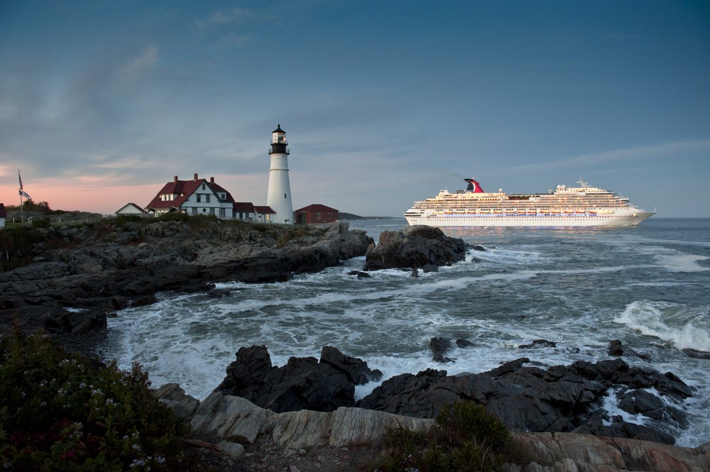 Cruise ship past lighthouse