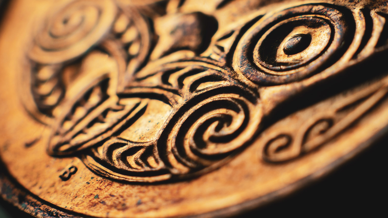 A close view of a traditional maori carving