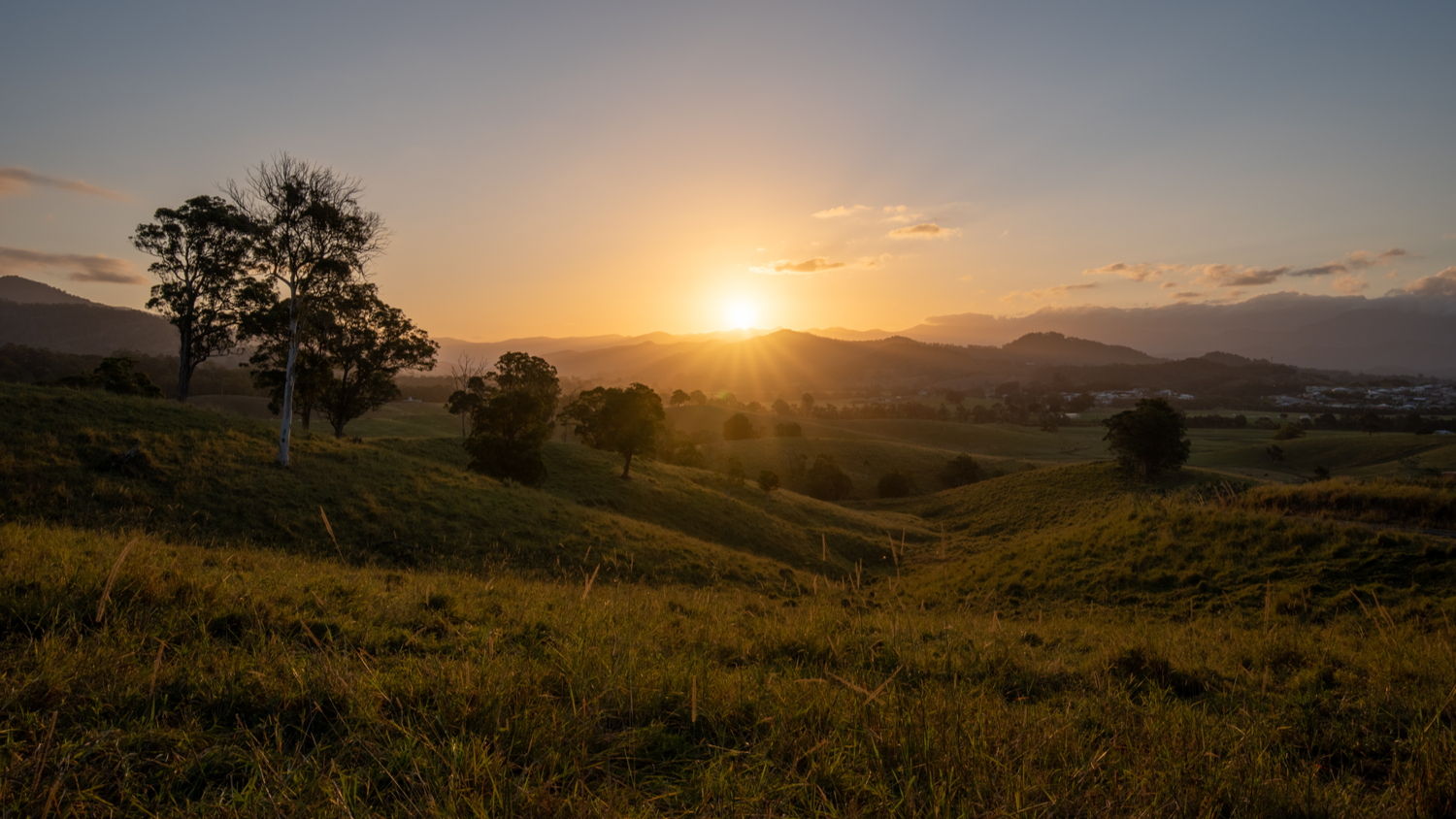 Sunset and shadows across the farm fields and landscape of Murwillumbah, NSW, Australia