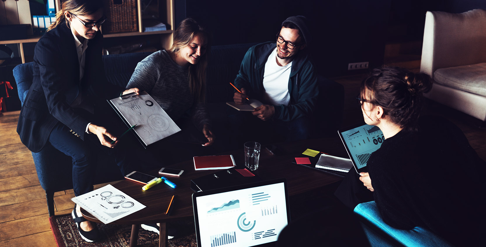 A marketing team reviewing their personas and customer journey map 