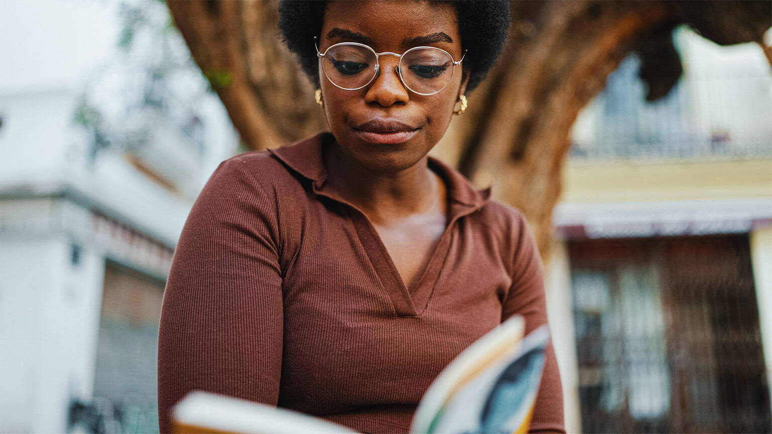 A healthcare worker absorbing a medical textbook