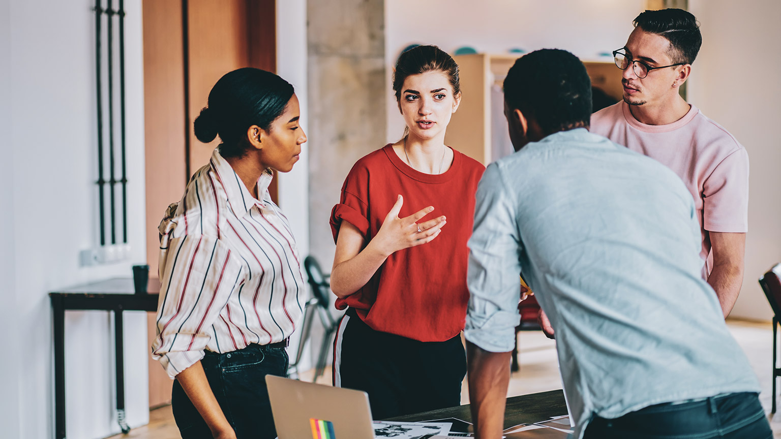 A group of designers discussing a project