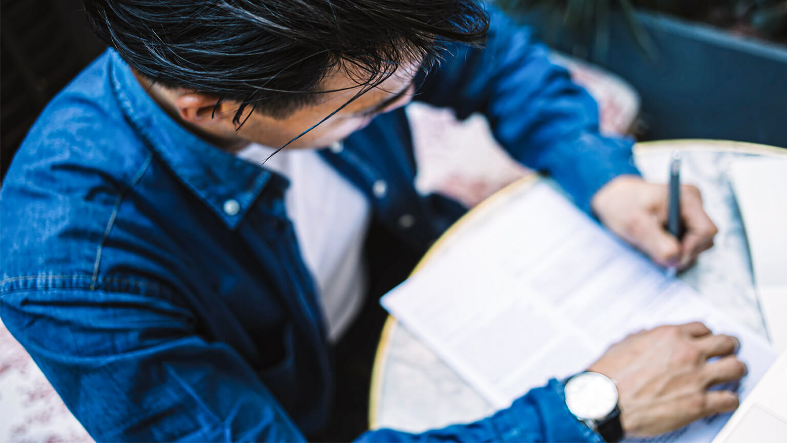 A student signing a Terms of Use policy from their online education provider