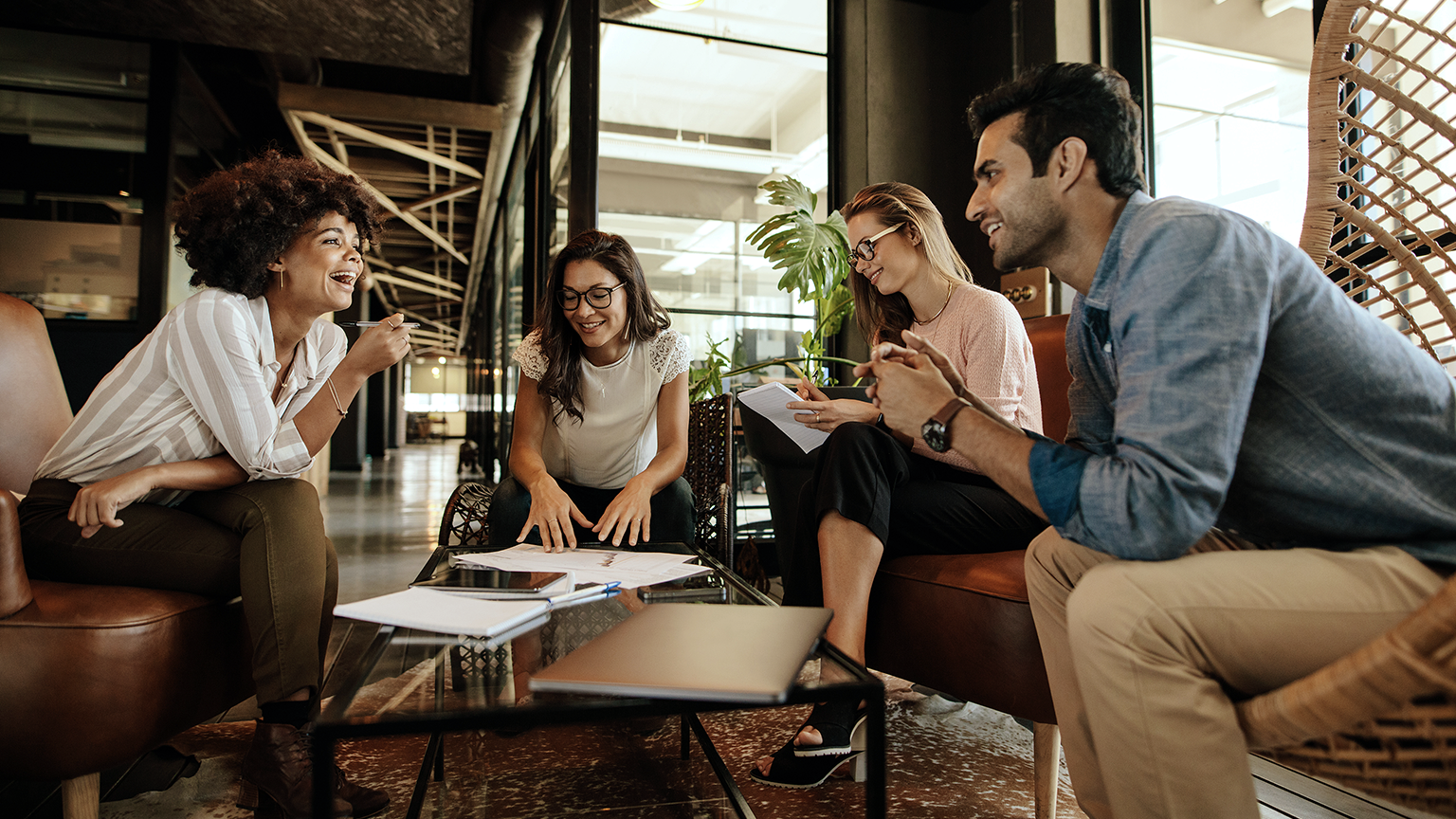 Group of people having a conversation over a new project