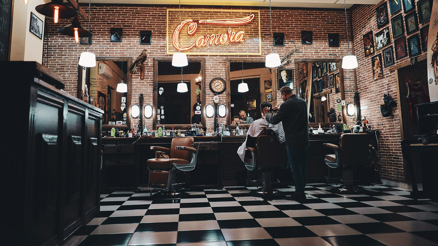 A wide shot of a barber shop