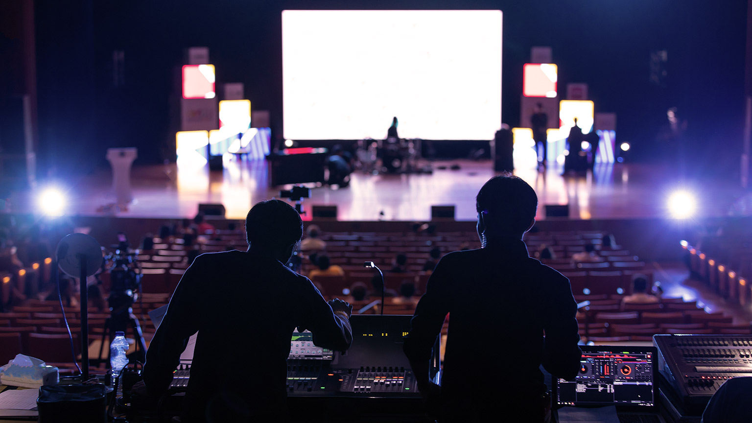 Sound engineers preparing for the event