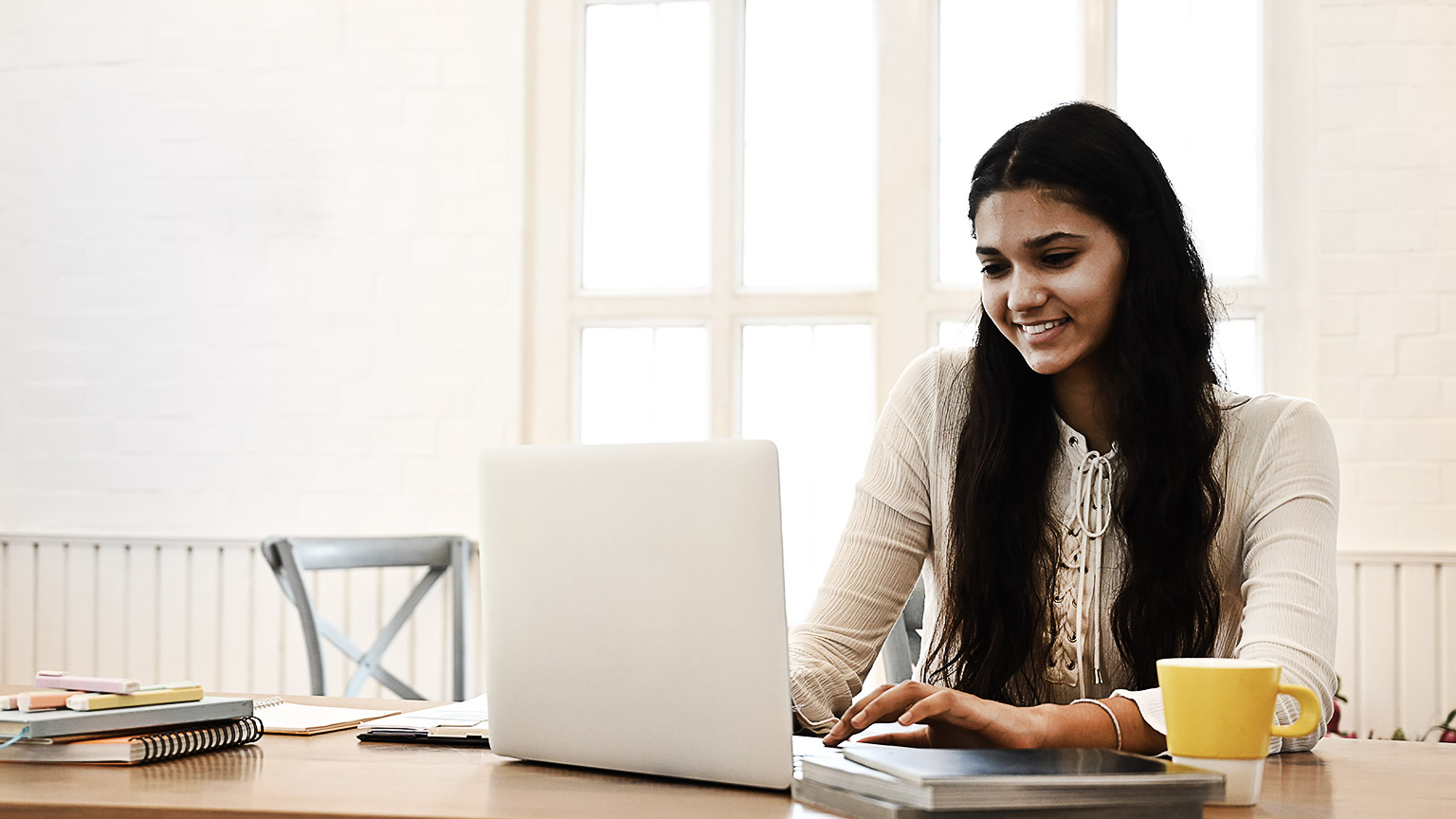 A student using a laptop