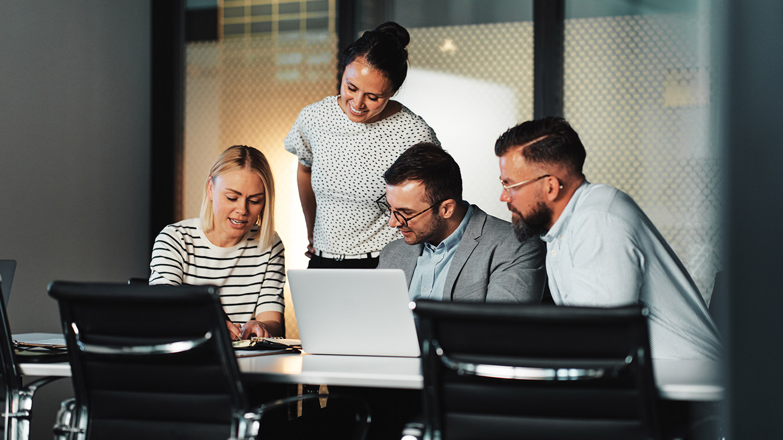 A busienss group discussing a purchasing decision