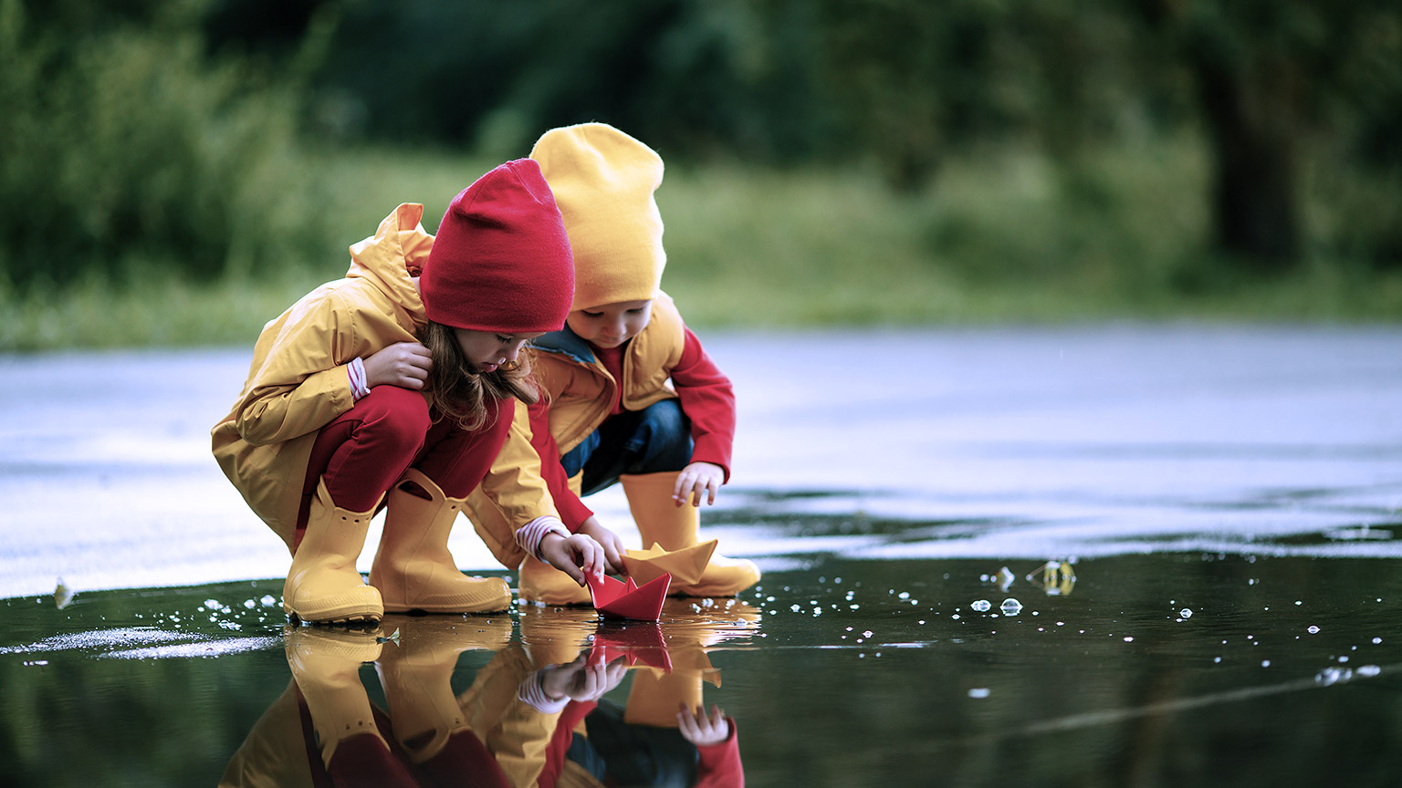 Children playing paper boat