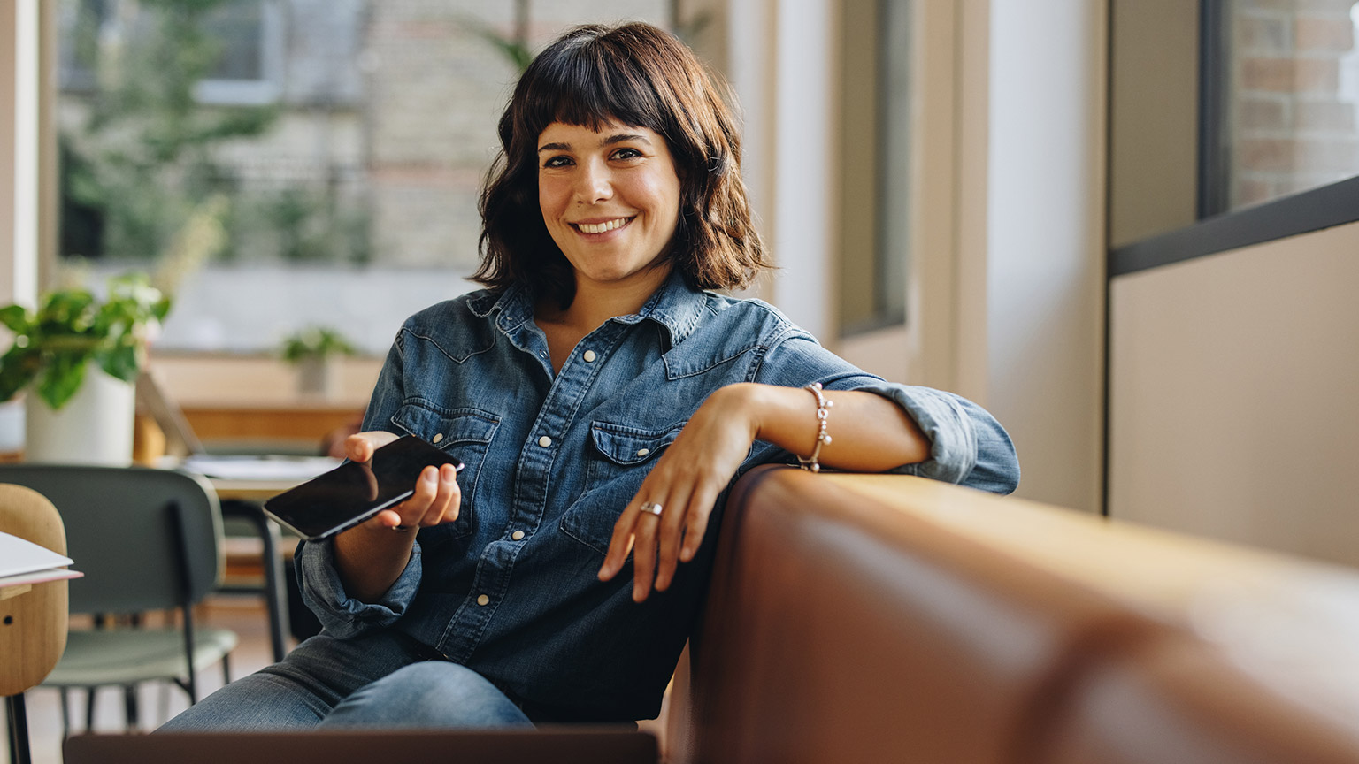 A young professional relaxing on a couch