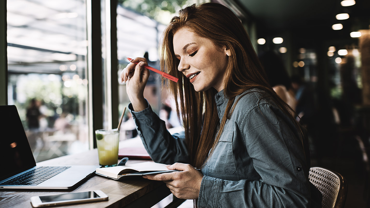 A person studying in a cafe