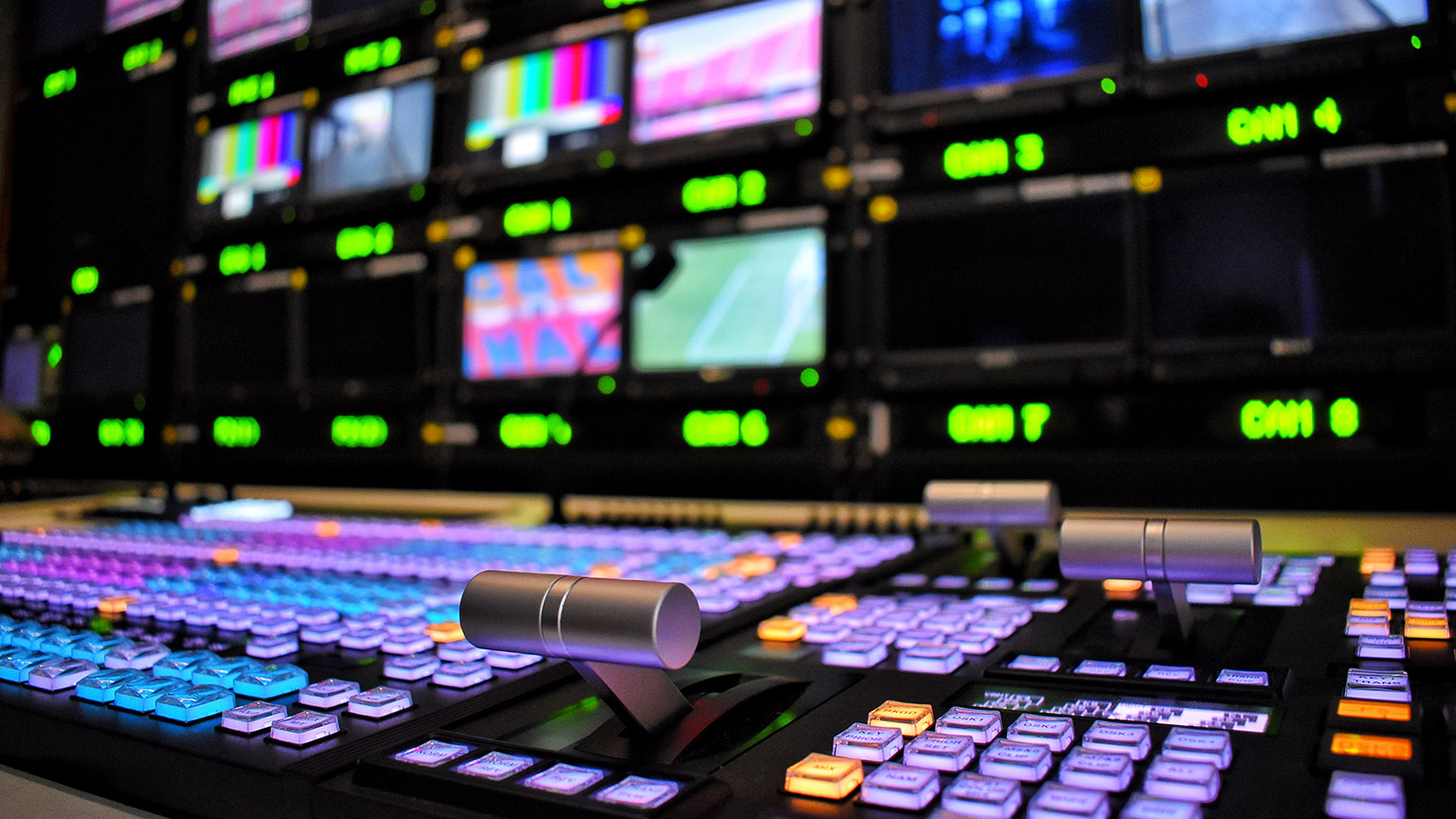 A close view of a broadcast control panel setup