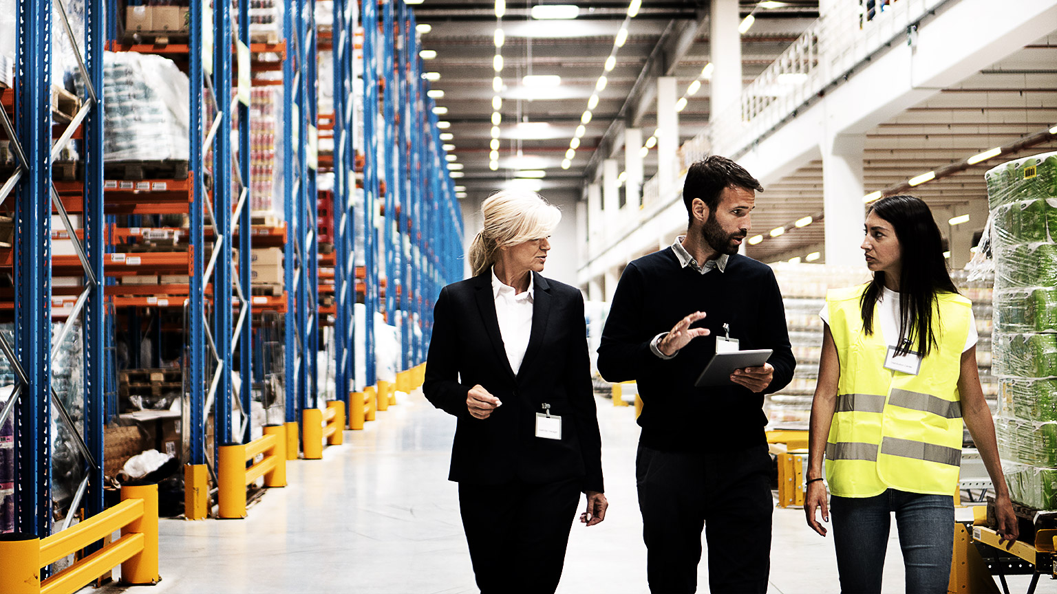 A person talking in a warehouse of a supplier