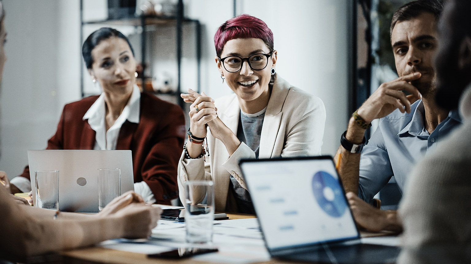 A group of people discussing data