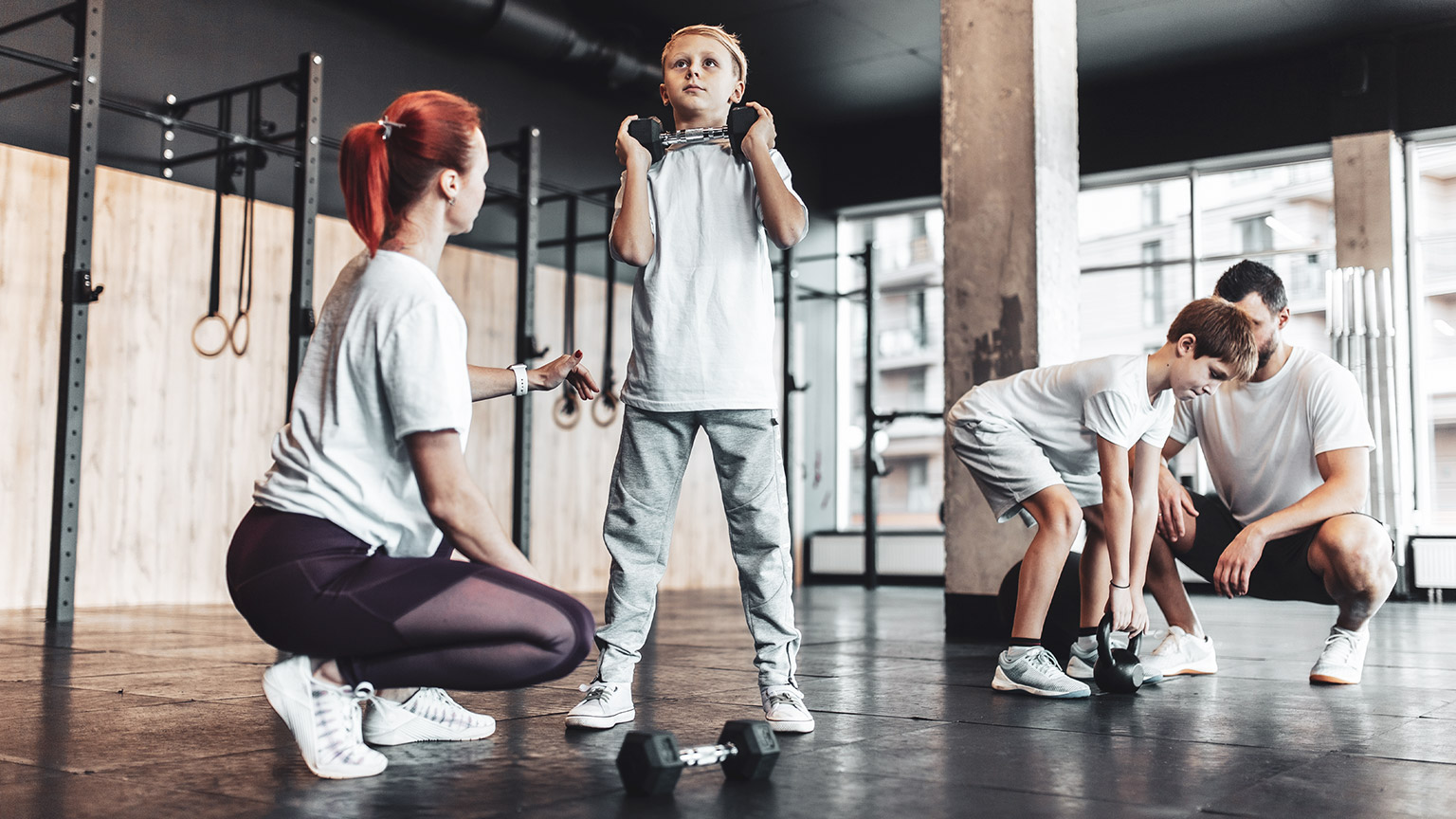 2 trainers working with children