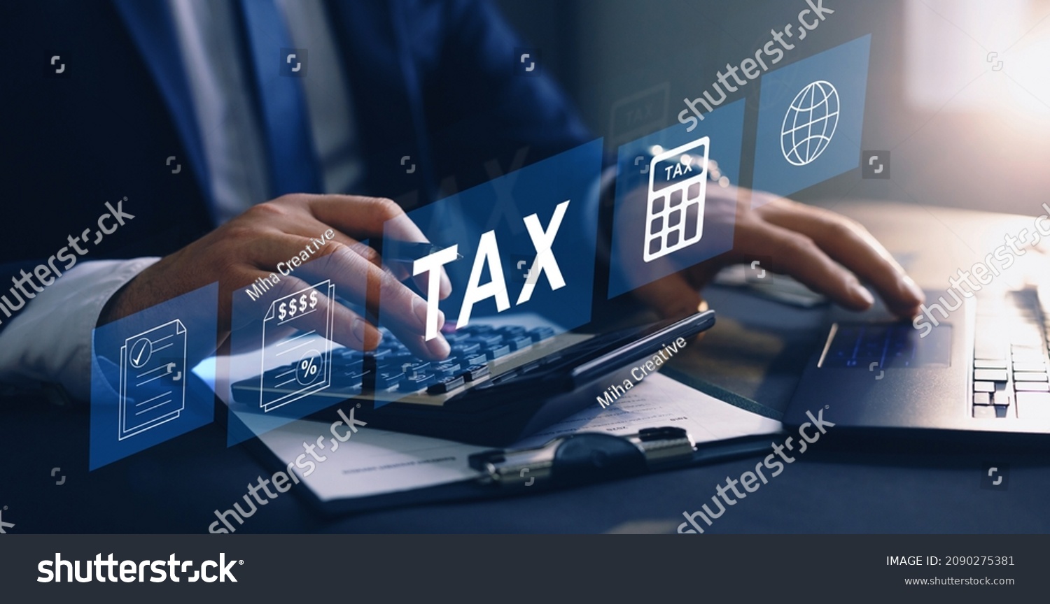 Businessman using the laptop to fill in the income tax online return form for payment. Financial research,government taxes and calculation tax return concept. Tax and Vat concept