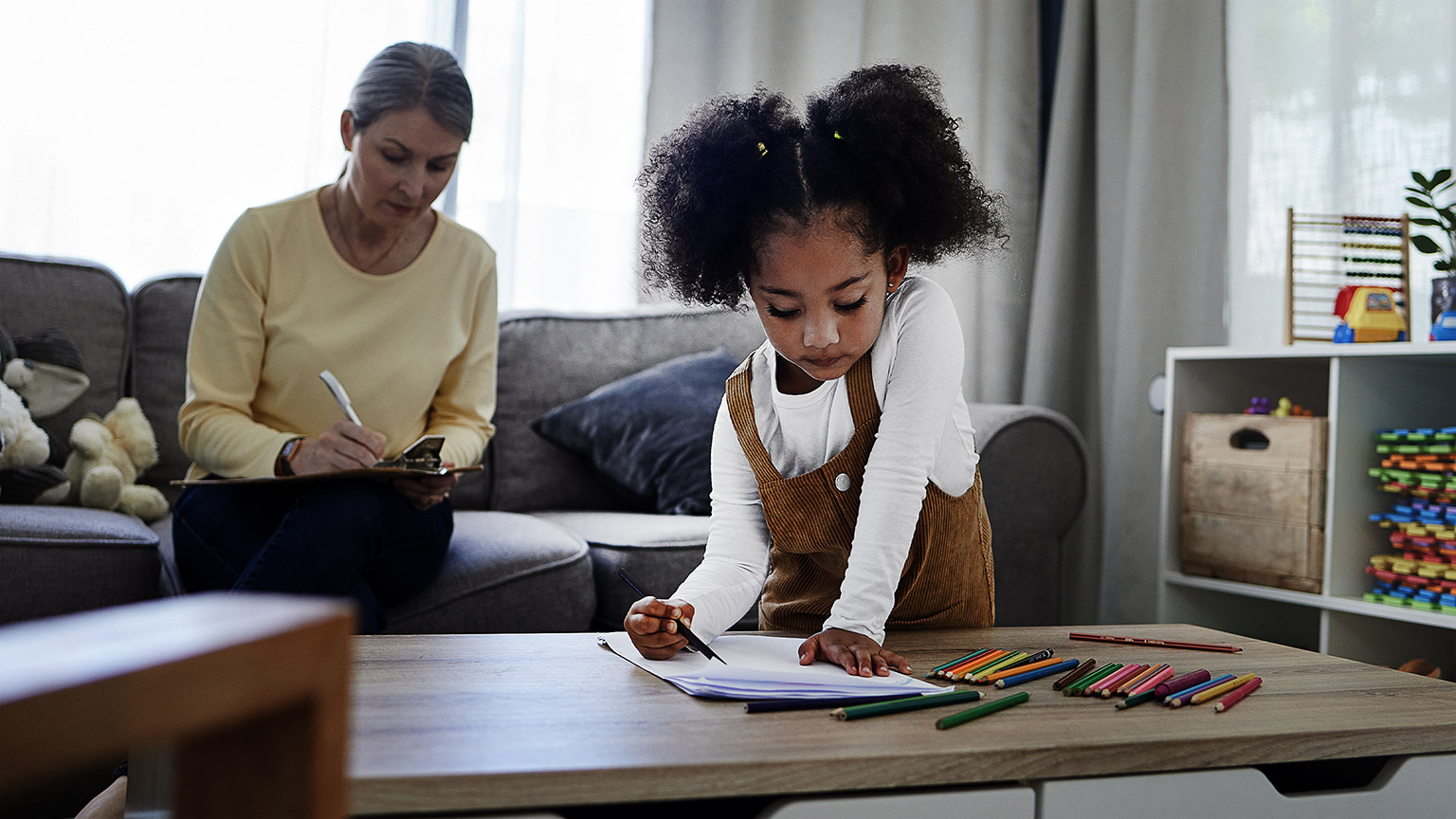 A person being attentive to a child in their care