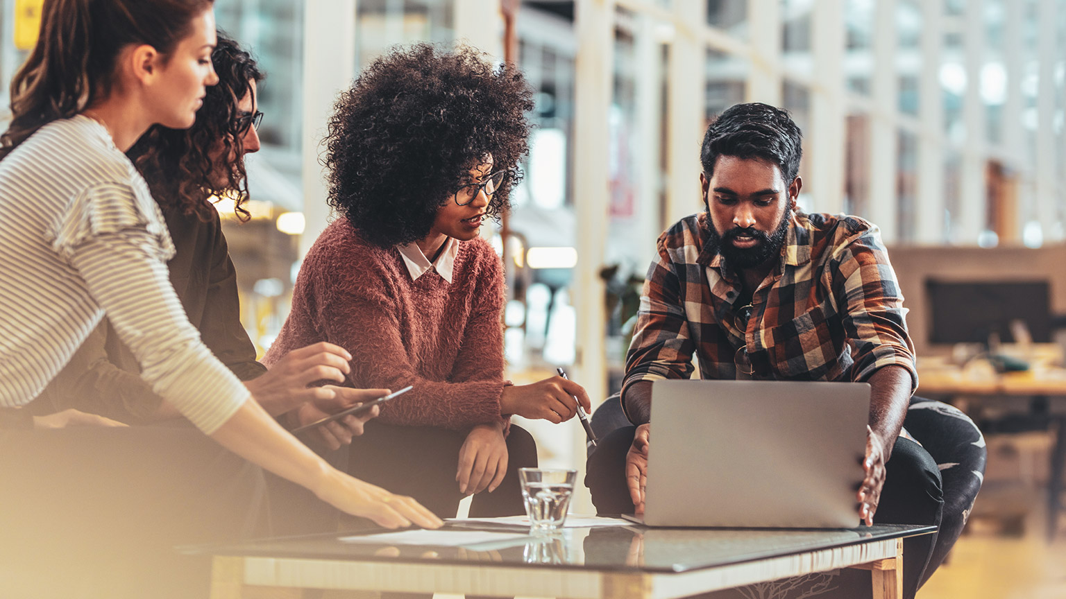 People in a meeting from different cultures