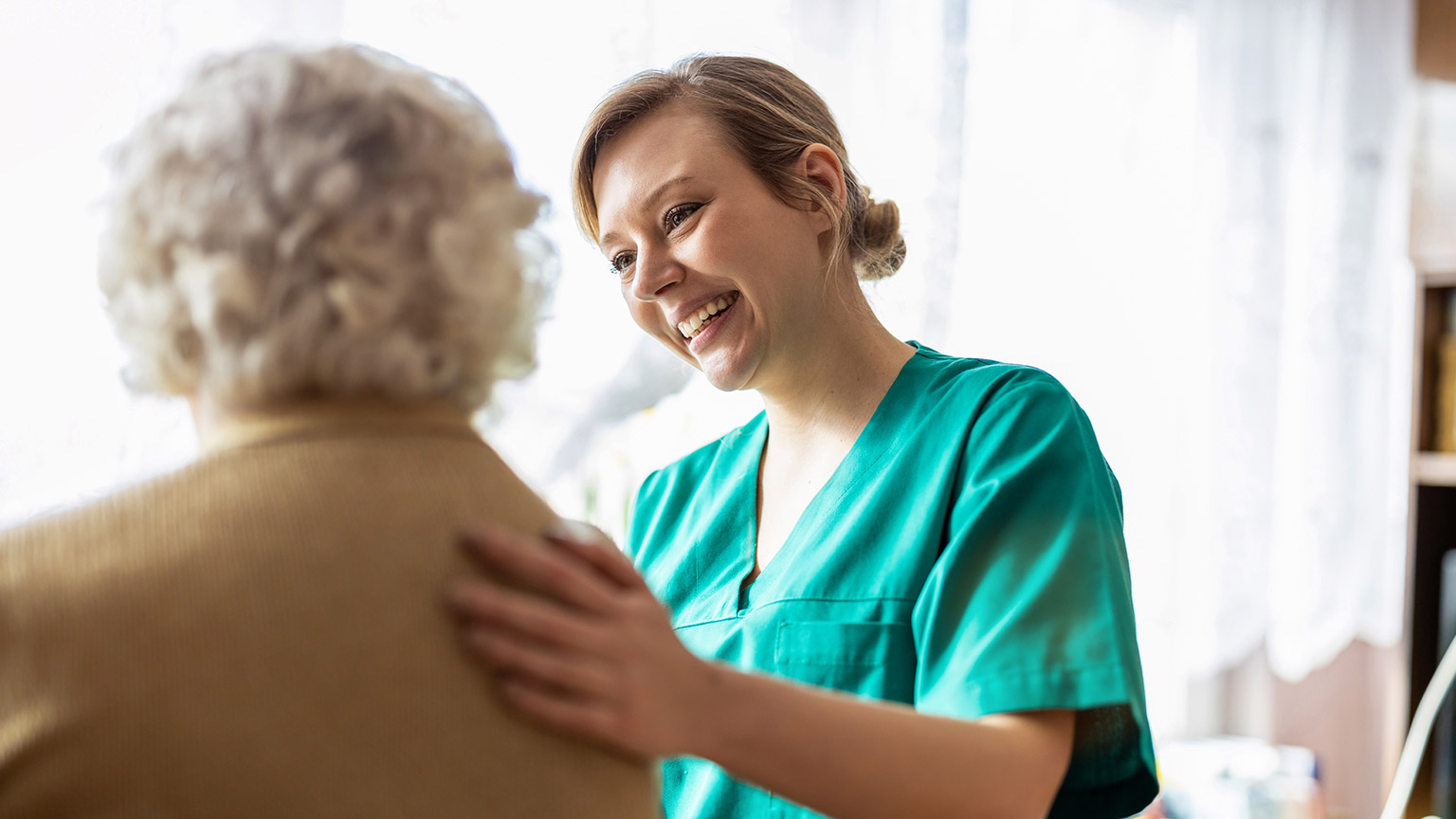 A carer talking to a client