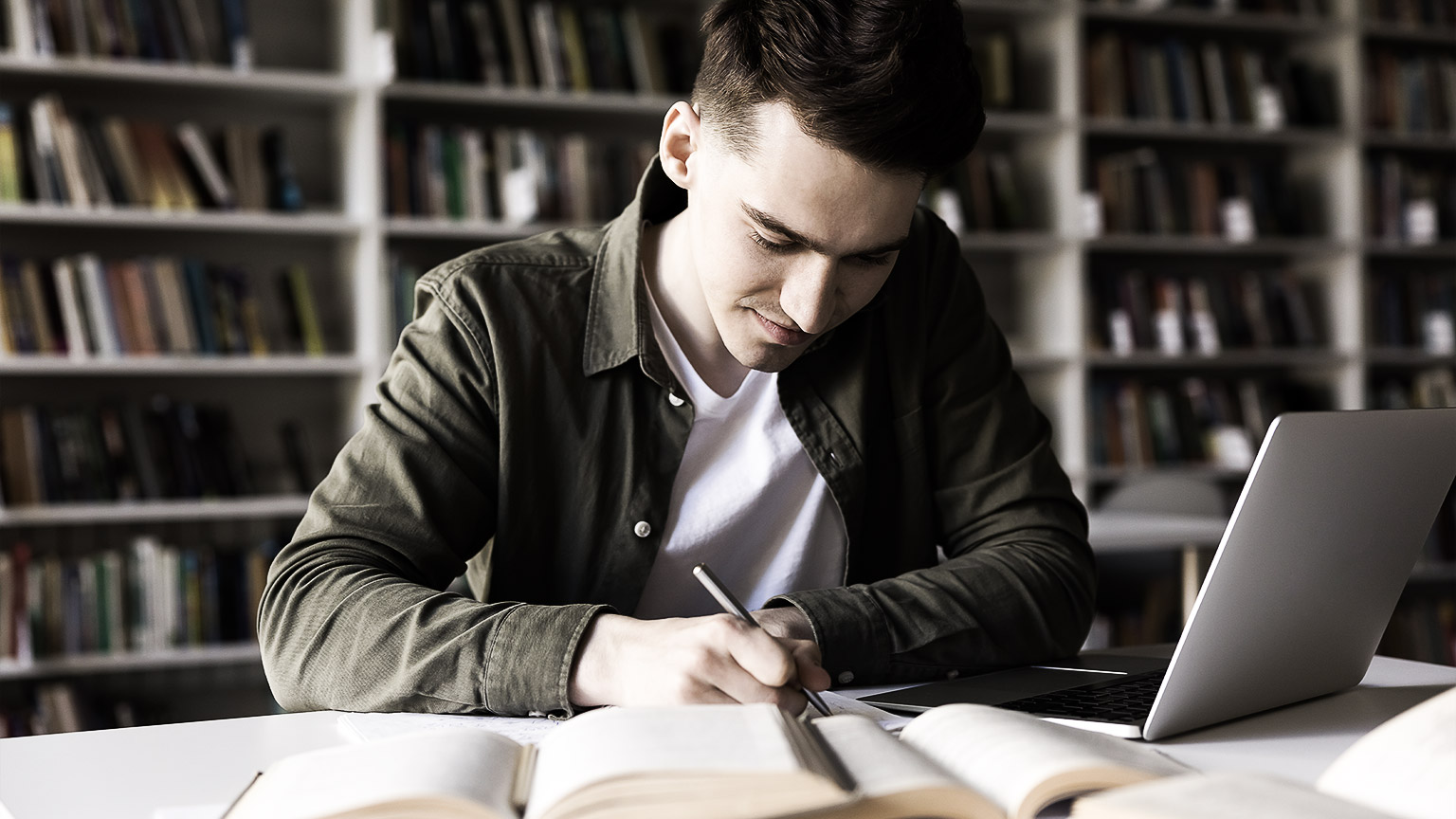 A person studying in a library