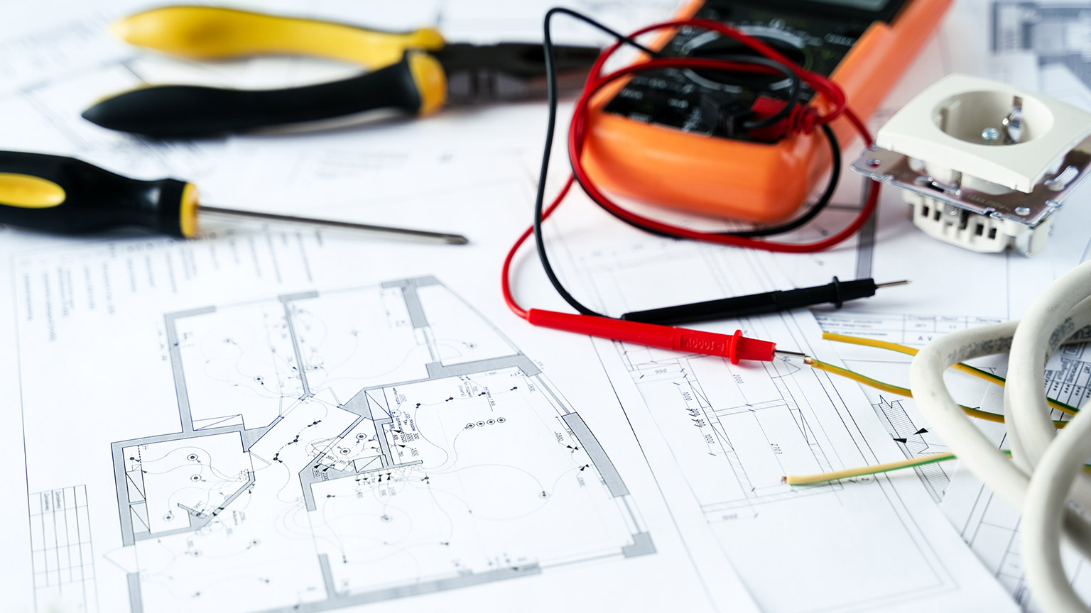 A close view of an electrical plan on a table