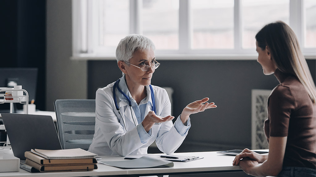 A doctor talking to a patient