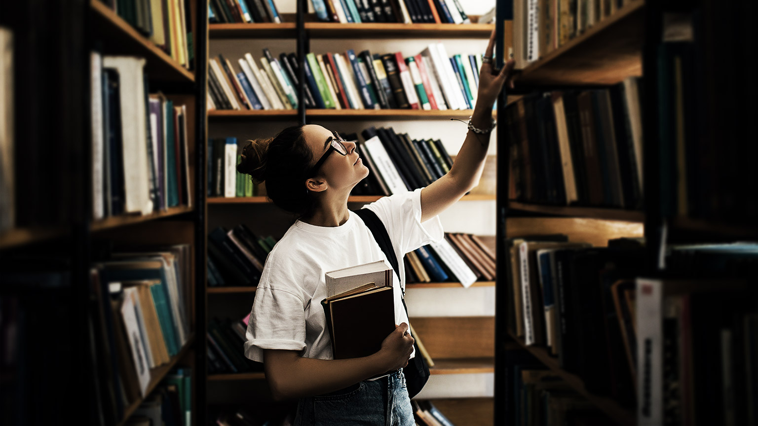 A person browsing for book s in the library