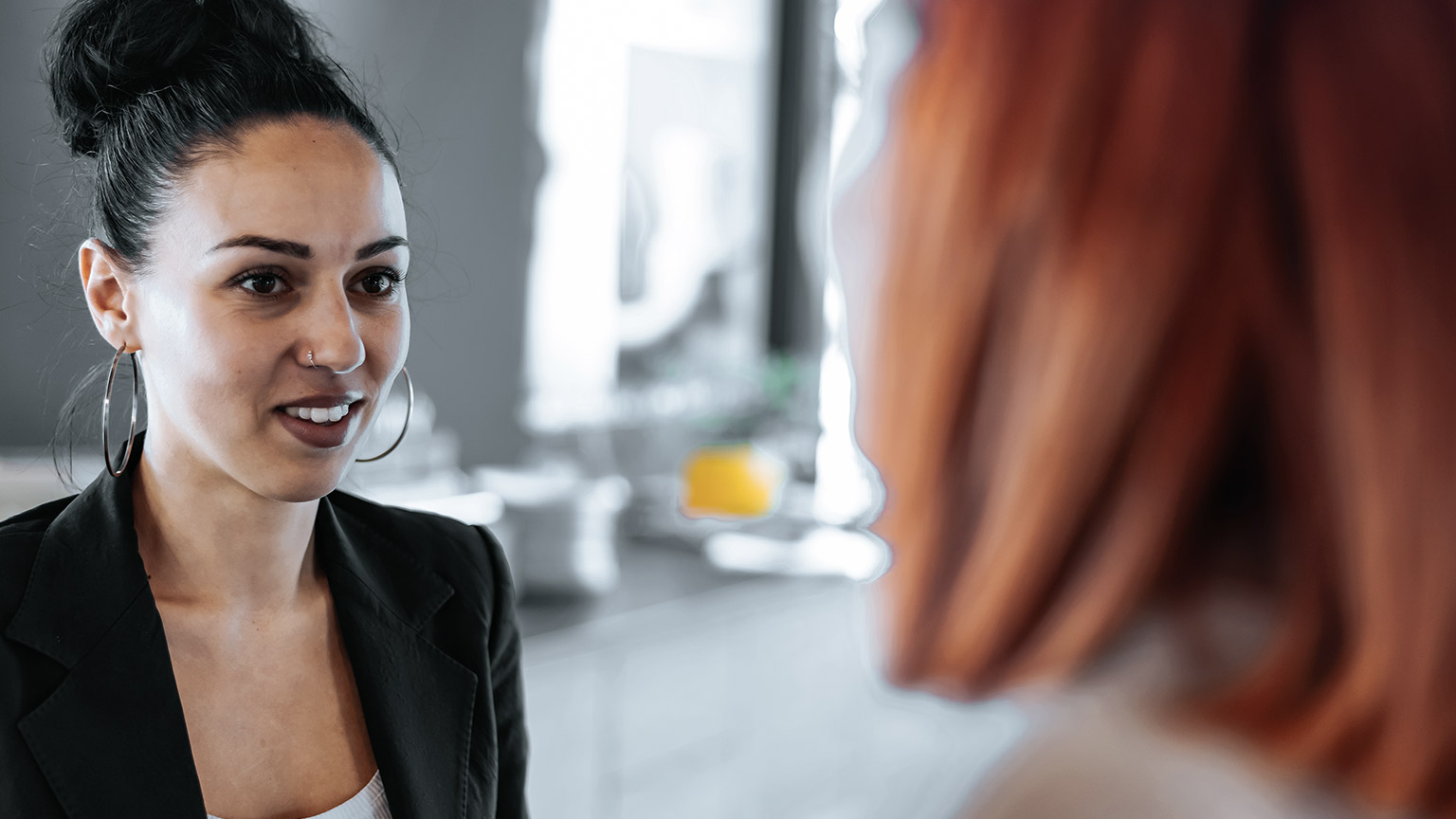 Two women talking