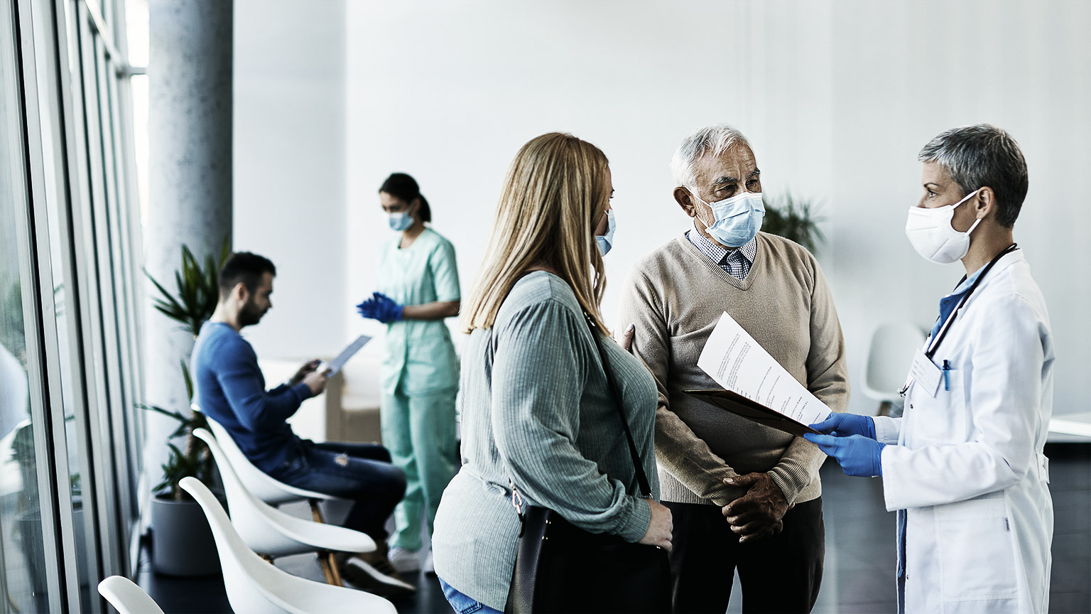 patient and doctor talking through medical centre