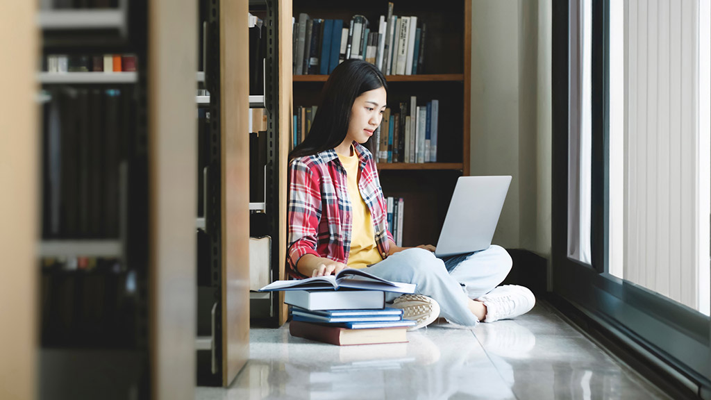 Smart student studying in library