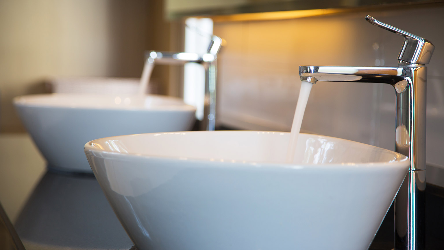 A modern bathroom with lighting