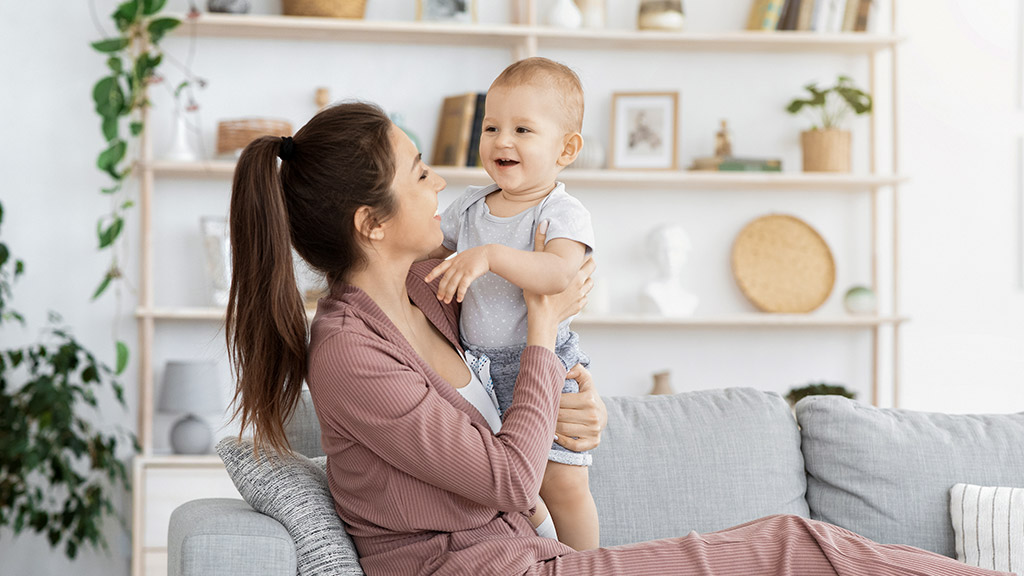 Mom Bonding With Her Little Baby Son At Home