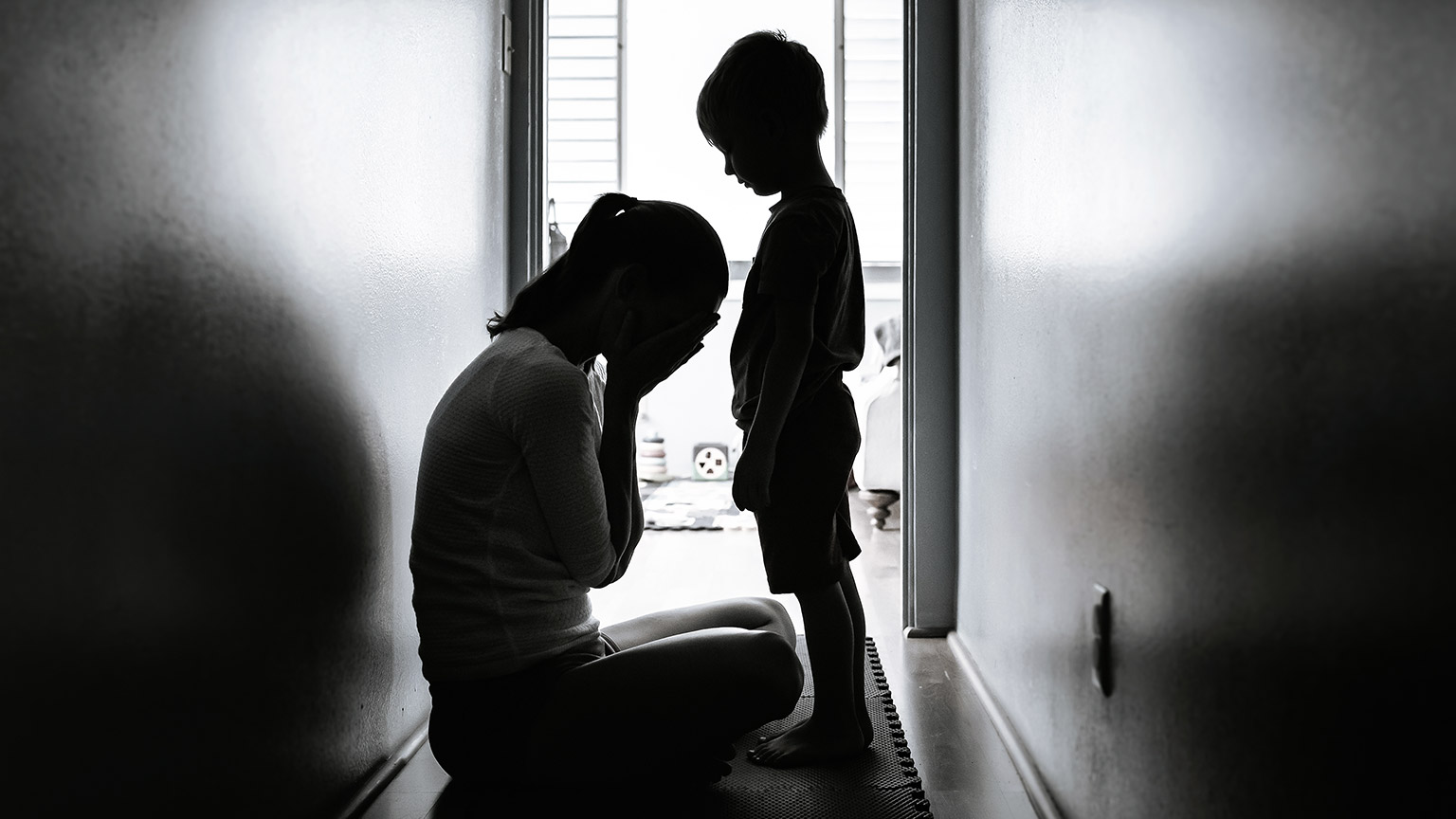 mother crying with child