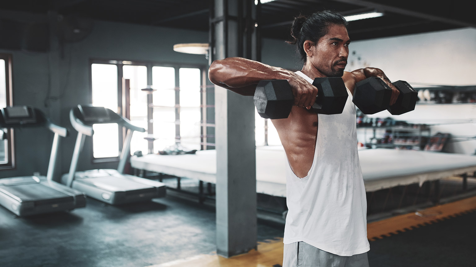 A man working out at a gym 