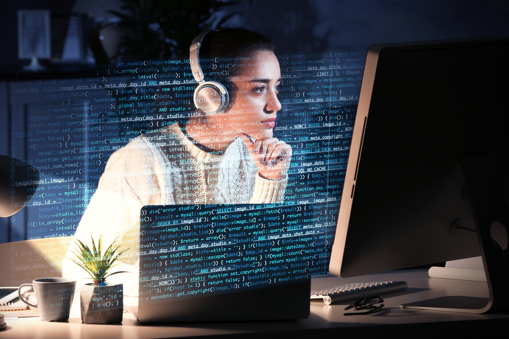 Stock Photo ID: 753780223 Young woman working with computer at table. Concept of cyber attack